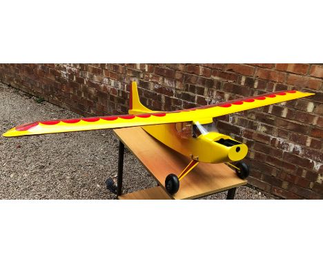 SCALE MODEL OF SUPER 60 YELLOW AND RED PLANE