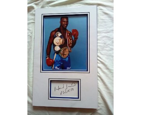 Evander Holyfield signed autograph presentation. High quality professionally mounted 17 x 11 inch overall sized display. 3D d
