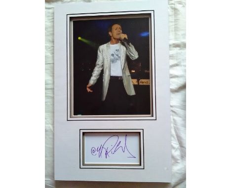 Cliff Richard signed autograph presentation. High quality professionally mounted 17 x 11 inch overall sized display. 3D doubl