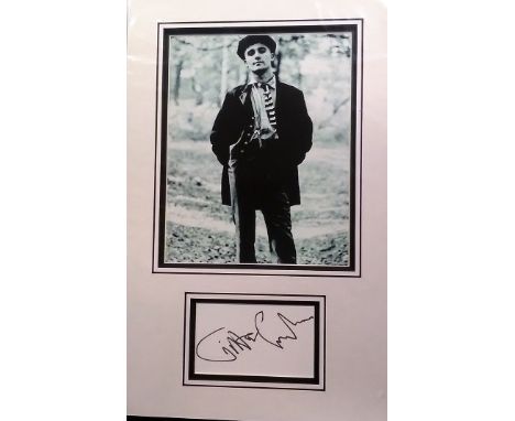 Gilbert O'Sullivan signed autograph presentation. High quality professionally mounted 17 x 11 inch overall sized display. 3D 