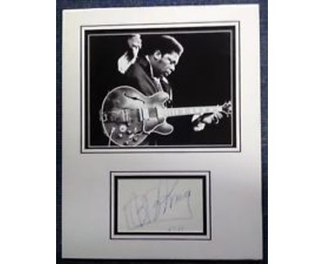 BB King signed autograph presentation. High quality professionally mounted 16 x 13 inch overall sized display. 3D double moun