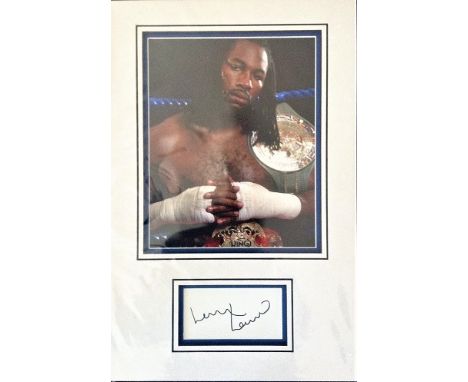 Lennox Lewis signed autograph presentation. High quality professionally mounted 17 x 11 inch overall sized display. 3D double