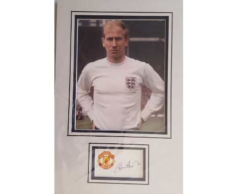 Bobby Charlton signed autograph presentation. High quality professionally mounted 16 x 11 inch overall sized display. 3D doub