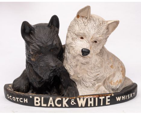 A mid 20th century 'Black &amp; White' Scotch whisky advertising model of two Terriers on a demi lune base,: 52 x 82cm (damag