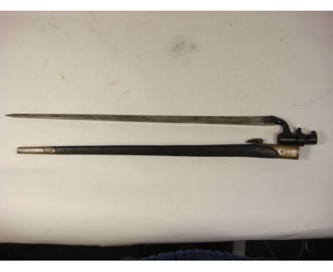 An 1876 pattern Martini Henry bayonet: with War Department stamps to ricasso, in a gilt brass mounted black leather scabbard 