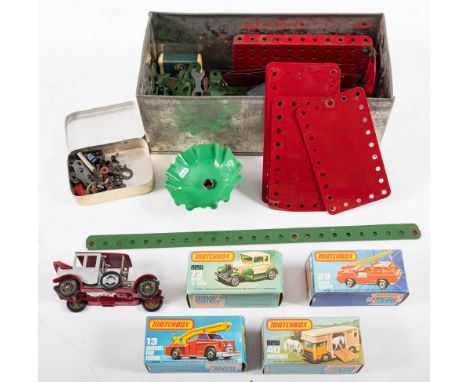 A boxed group of four 1970 Matchbox vehicles: No 13' Snorkel Fire Engine', No 22 'Blaze Buste'r, No 40 'New Horsebox' and No 