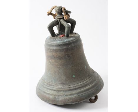 A bronze bell with crown top and suspension ring,: unsigned 32cm high.