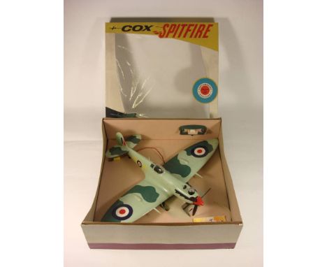 L M Cox Manufacturing (USA) Ready to Fly  Thimble drone Spitfire:, light and dark green plastic camouflage body and wings, ap