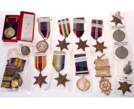A WWI trio to '11592 Pte T Stock Devon R',: together with a WWI miniature group of four and a collection of WWII service meda