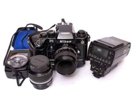 A Nikon F4 35mm SLR camera: with MB 21 battery pack, 55mm, F2.8 Micro Nikkor lens, together with 50mm, F2 Nikkor lens, Mecabl