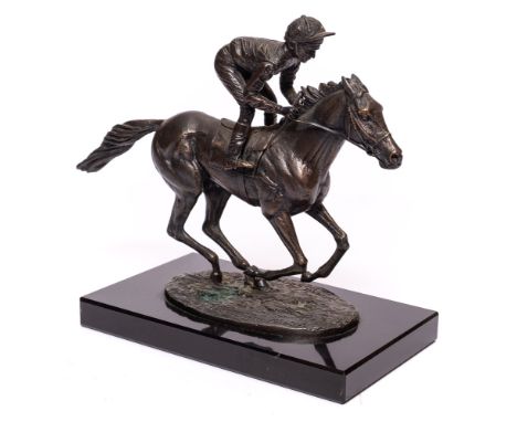 David Cornell, 'Champion Finish', bronze of Lester Piggott up: on an oval plinth signed  and dated 1985, on a black slate bas