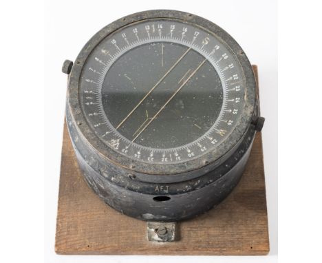 A  US Army Type D-12 spit bar compass by the Bendix Aviation Company: with 4 inch liquid filled dial in a matt black case, mo