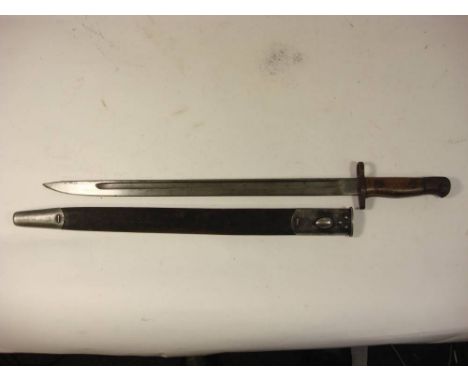 A 1907 pattern bayonet by Sanderson: the blade stamped and dated '3-16' over two piece wooden grip, note missing cleaning hol