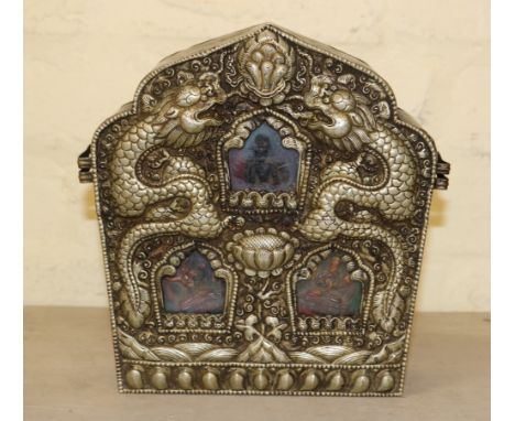 A Tibetan shrine of copper and bitong with repousse decoration of 2 dragon pursuing the flaming pearl
