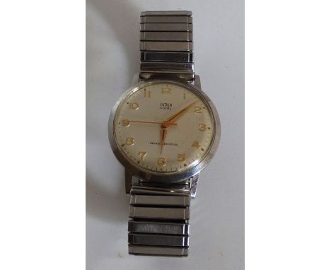 A Gentleman's Tudor Royal stainless steel watch with expanding strap, engraved on the back R W G , for loyal service&nbsp; , 