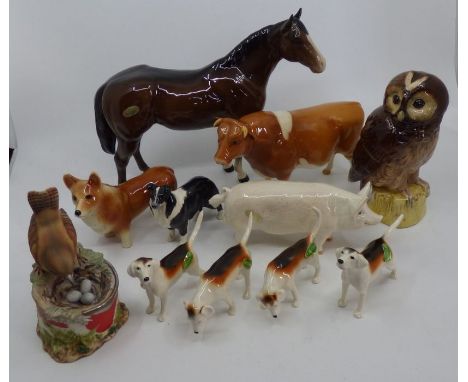 Quantity of Beswick animals , to include 9 Beswick , a Royal Doulton Whyte & Mackay scotch whisky tawny owl and a Chancery co