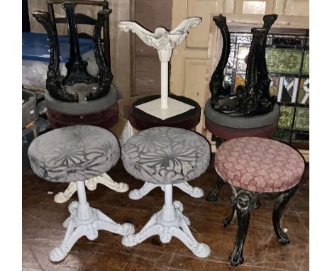 A set of eight various 20th Century cast iron barstools; plus one cast iron stool frame (9)Provenance:The Content of Unicorn 