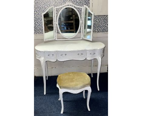 A 20th century French design dressing table, arch top rectangular mirror flanked by twin mirrors, kidney shape and serpentine