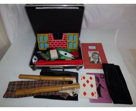 Case of magicians magic tricks , including some trick instructions and the spongeball routine by Joe Riding .