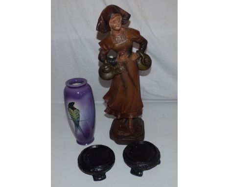 An early 20th plaster figure of a milkmaid impressed with monogram C.F. no 224 and Paris, 51cm high, an Ault pottery vase pai
