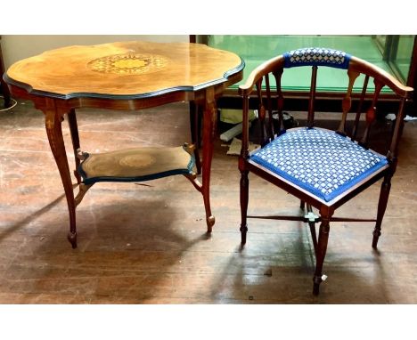 A late 19th century rosewood and satinwood strung centre table, circa 1890, serpentine top with satinwood stringing panel, ra