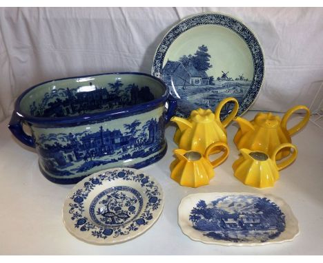 2 Carltonware yellow teapots and jugs , a blue and white footbath and other blue and white items .good condition .