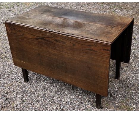 A 19th century oak gate leg table, raised on four tapering square legs 70.5cm H x 151cm W x 107 D 