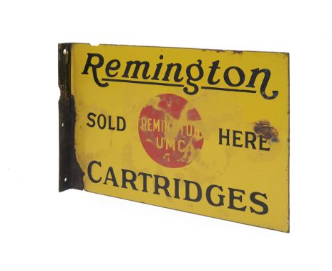 A REMINGTON UMC CARTRIDGES ENAMEL ADVERTISING SHOP SIGN, circa 1920s, right-angle wall mount (some losses to the enamel on th
