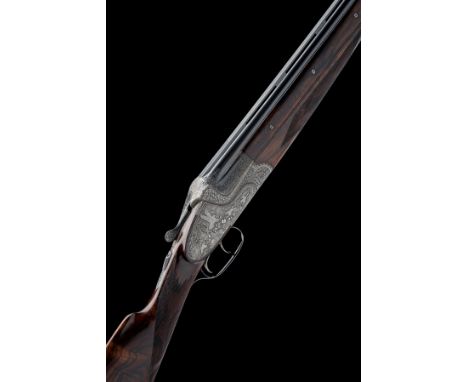 MERKEL FRERES A 12-BORE DOUBLE-TRIGGER OVER AND UNDER HAND-DETACHABLE SIDELOCK EJECTOR, serial no. 96366, dated 1985, 28in. n