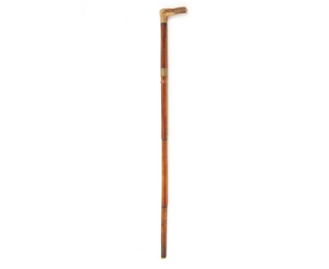 A 7mm (W/S) WALKING-STICK SHOTGUN OF DUMONTHIER TYPE, no visible serial number, with cane covered 24 1/4in. barrel (some spli