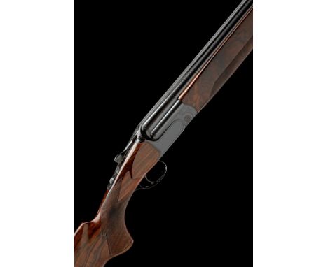 PERAZZI A 12-BORE 'MX12' SINGLE-TRIGGER OVER AND UNDER EJECTOR, serial no. 129662, for 2004, 31 1/2in. (80cm) nitro barrels w