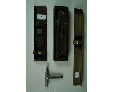 A group of early 20th Century printer's type-setting tools