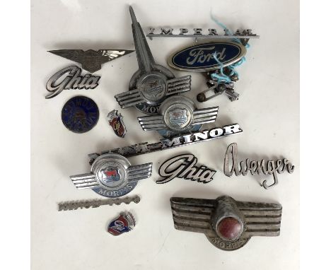 A number of classic Morris, Ford, Hillman and other car badges 
