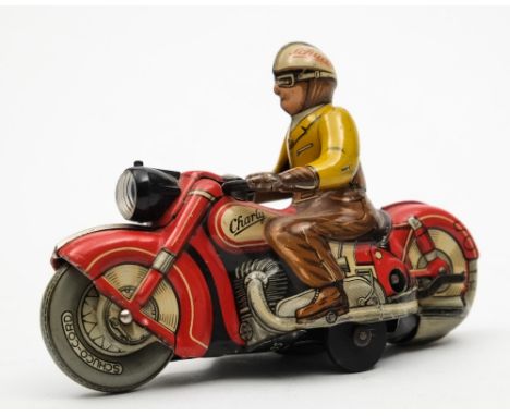 A post war Schuco  'Charley 1005' clockwork tinplate motorcycle and rider:, with polychrome lithograph rider and motorcycle, 