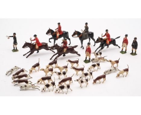 A collection of Britains Fox hunting figures:, comprising five riders on horseback, four standing figures and twenty-five hou