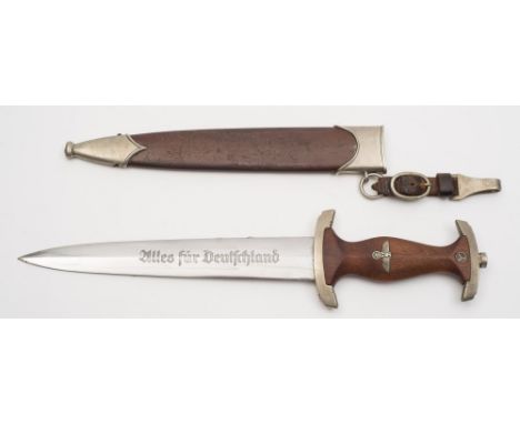A Third Reich period SA dagger by Looper:, the double edged blade with inscription to one side and maker's mark to the other,