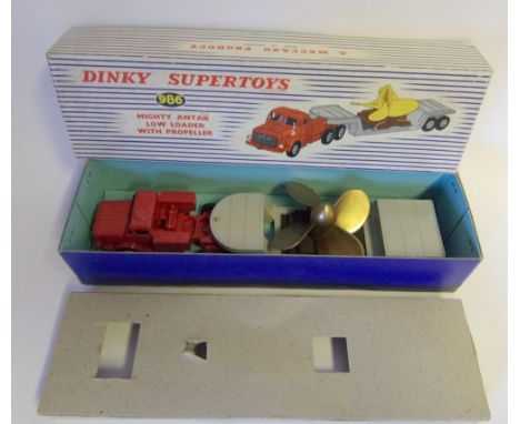 Dinky, No 986 Mighty Antar Low Loader with Propeller: red body, light grey trailer, with original card insert and box