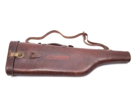 A  brown leather leg o' mutton gun case:, 80cm long.