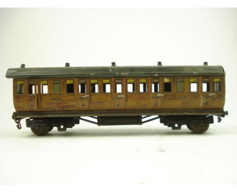 A GWR livery  First & Third Class Passenger coach No 2875 by Marklin, Germany,:,  A W Gamge Ltd retailer's mark to underside,
