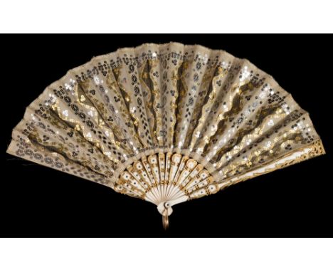 A Regency period ivory fan: with silk leaf having applied sequin decoration, with inlaid and gilt decorated sticks and simila