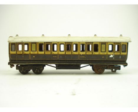 An L & NWR First & Third class passenger coach No 1153 by Marklin, Germany:, playworn condition , missing one pair of wheels,