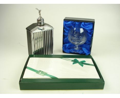 A mid-20th century musical decanter in the form of a Rolls-Royce radiator, together with a commemorative crystal brandy glass