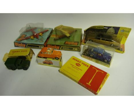 Dinky No 710 Beeshcraft S35 Bonanza: No 715 Beechcraft C55 Baron, both in blister packs, No 129 Volkswagen De Luxe Saloon, No
