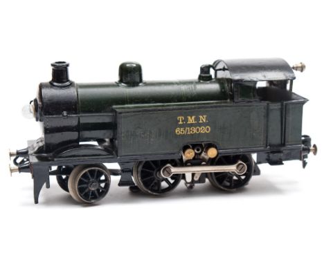A Marklin O gauge three rail electric 2-4-0 locomotive:, in green and black numbered 'TMN 65/13020' to slab sided tanks.