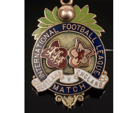 A 9ct gold and enamel International Football League medal awarded to Alexander 'Alex' Bennett, Scotland vs England 1908:, obv