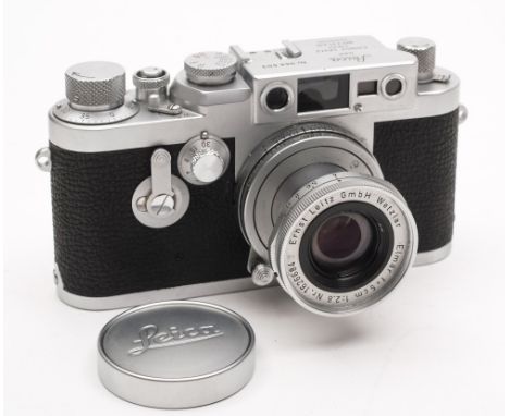 A Leica III Model G camera with Leitz Elmar 50mm F2.8lens circa 1959:, black crackle finish to body and silvered finish, numb