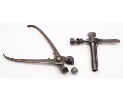 An Enfield  T- shaped combination tool:, stamped with crown and numbered 30 to top, also stamped 'TP' to crosspiece, with pri