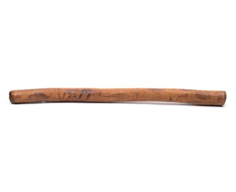 A didgeridoo:, of traditional form with chop carved emu and kangaroo decoration, 93cm long.