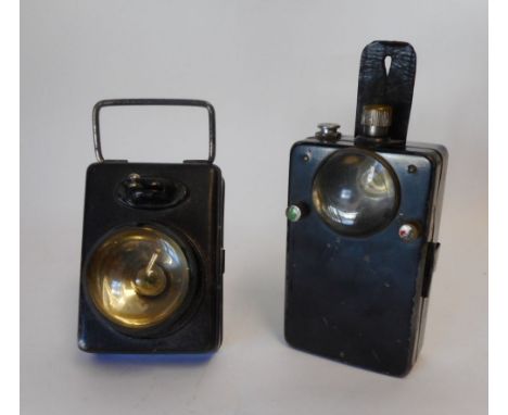 A G.W.R signalman's lapel lamp: stamped GWR, 10cm. high. and one other.