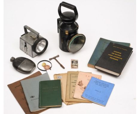 A BR tri-colour signal lamp together with a later BR battery version and a quantity of BR handbooks etc:.